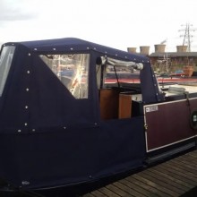 Narrowboat pram with door rolled up