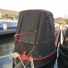 Narrowboat pram with window covers
